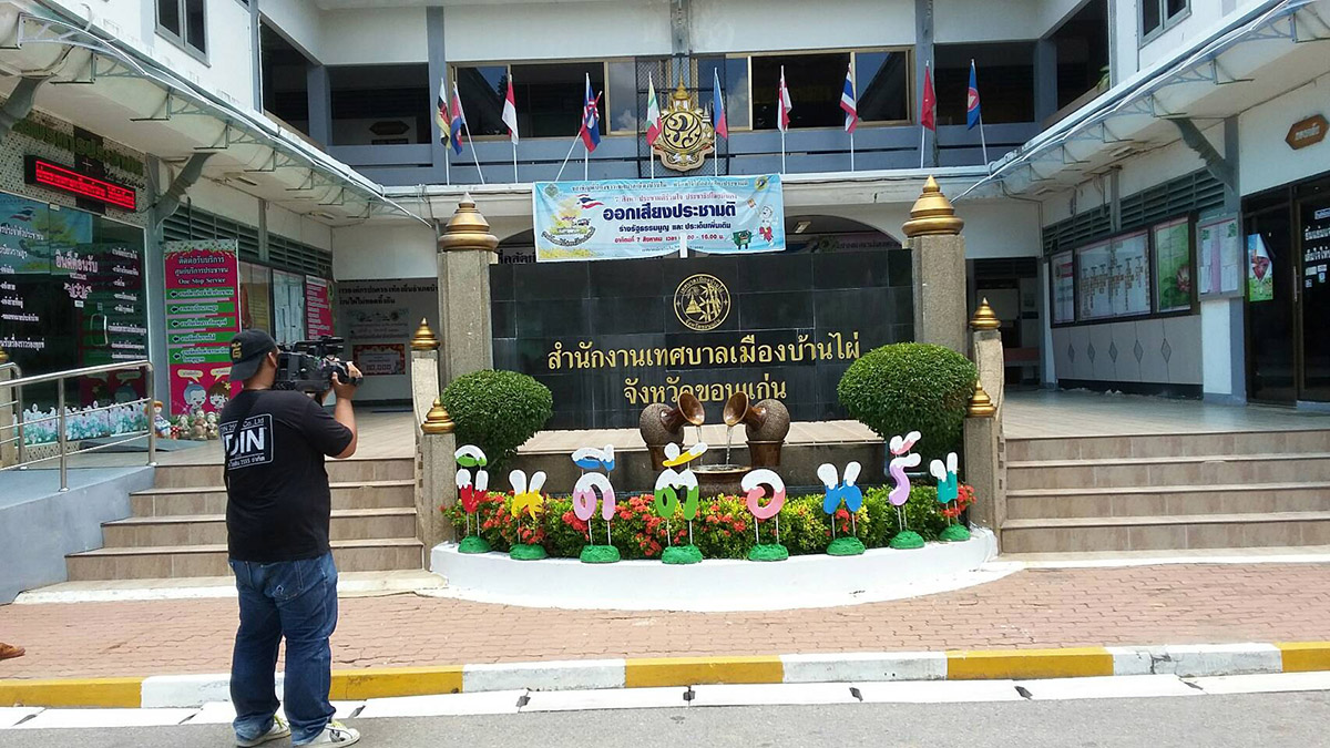 A reporter on Monday films the entrance to the office of mayor Premsak Piayura in Khon Kaen province.