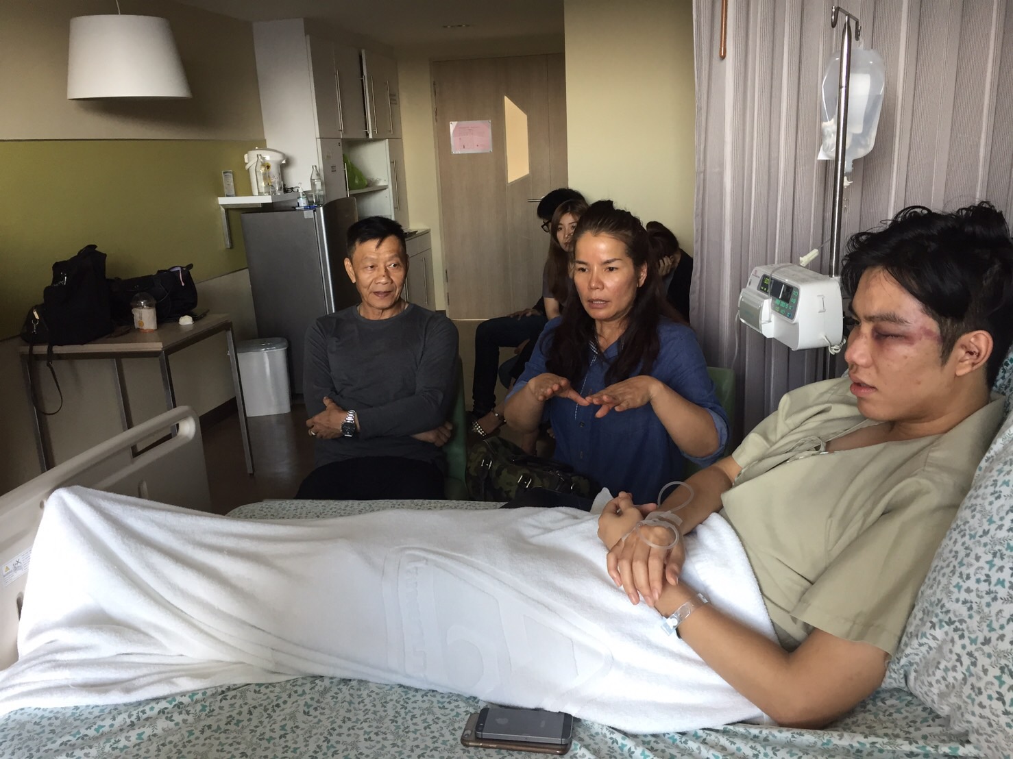 Issarajnuwat Wankawisan, at right, on Saturday at a hospital.