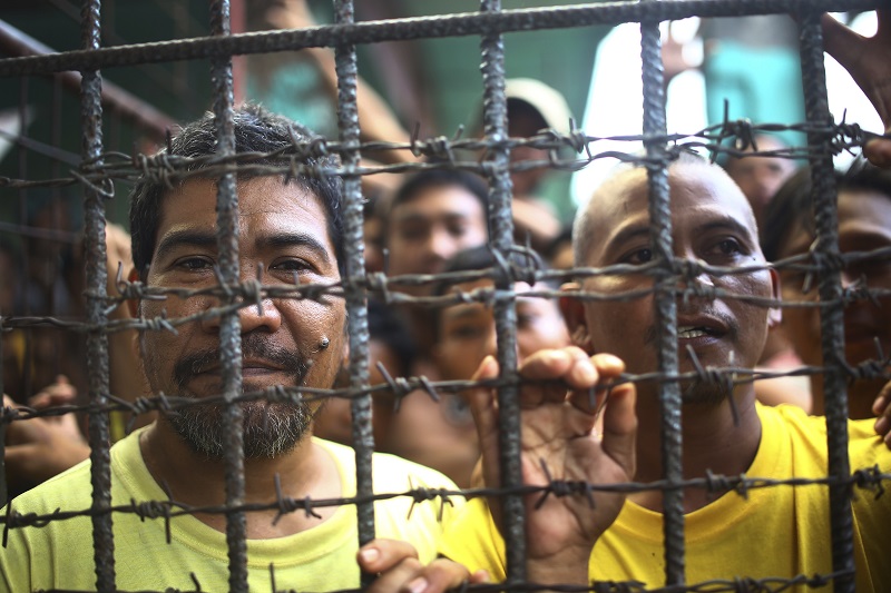 Filipino inmates remain in their cell at the North Cotabato District Jail in Kidapawan city, Cotabato Province, southern Philippines, after a massive jailbreak Wednesday. Photo: Associated Press