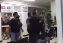 Masked Men Storm Police Station to Assault Suspects Who Punched Cop (Video)
