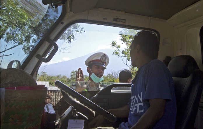 Evacuations from Bali volcano swell to more than 57000