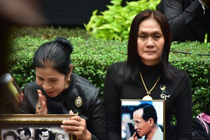 Mourners gathered Friday at Siriraj Hospital to mourn the first anniversary of the death of King Bhumibol.