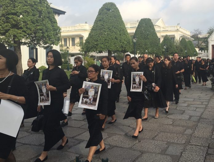 Mourners enter at Bangkok’s Grand Palace on Jan. 12 to pay respect to the late King Bhumibol, whose body was lying in state.