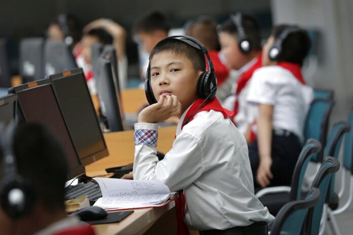 North Korean students use computer terminals at the Sci-Tech Complex in June in Pyongyang, North Korea. Photo: Wong Maye-E / Associated Press