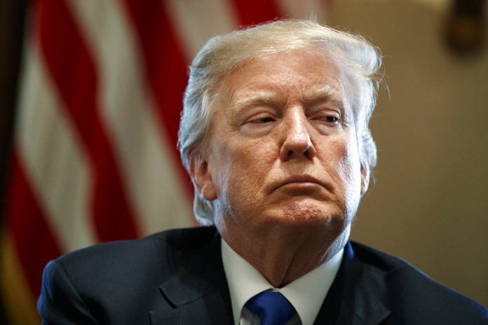 President Donald Trump listens in January during a meeting with lawmakers on immigration policy in the Cabinet Room of the White House in Washington. Photo: Evan Vucci / Associated Press President Donald Trump listens in January during a meeting with lawmakers on immigration policy in the Cabinet Room of the White House in Washington. Photo: Evan Vucci / Associated Press