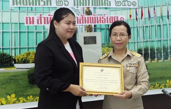 University student Panida Yospanya, 22, receives an award Feb. 26 from from Khon Kaen provincial government for speaking out about a fraud scheme in the province.