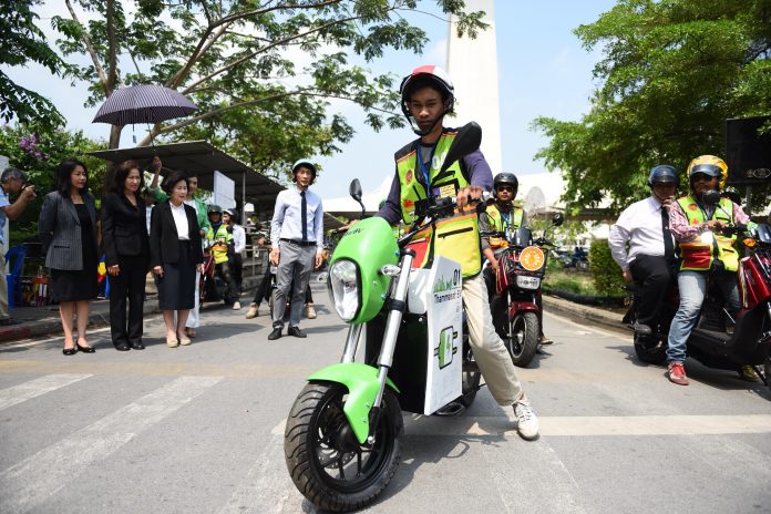 Motorcycle drivers on Thursday morning ride Sola Ryde at Thammasat University, Rangsit campus.