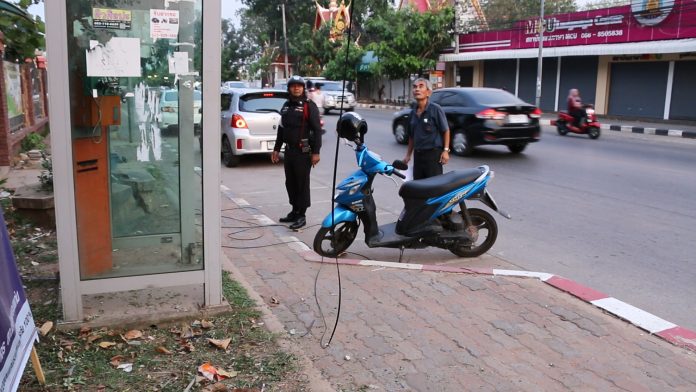 The scene Wednesday evening in Khon Kaen city, where Maneerat Charoen-ngao died after being struck by a hanging wire.