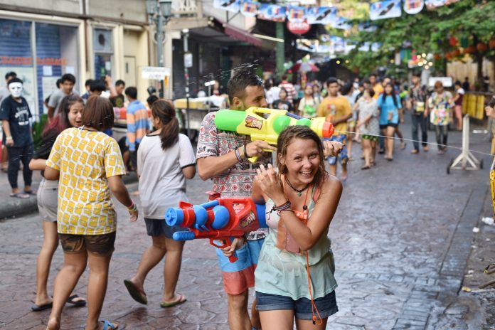 Revelers engage in waterfight in Bangkok during 2016 Songkran holidays