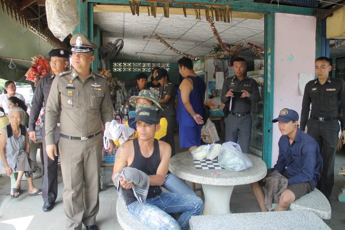 Three Burmeses – Dam, Daeng and Noi (sit on chairs) – during a re-enactment on Friday afternoon.