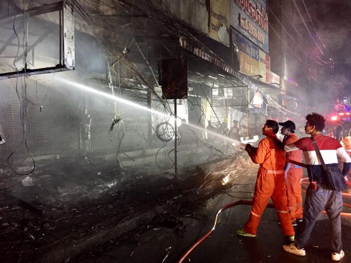 Firefighters respond to a fire early Wednesday morning near Central Plaza Lardprao in Bangkok. Firefighters respond to a fire early Wednesday morning near Central Plaza Lardprao in Bangkok.