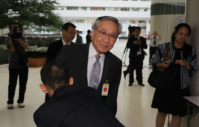 Don Pramudwinai arrives Wednesday at the Constitutional Court in Bangkok. Don Pramudwinai arrives Wednesday at the Constitutional Court in Bangkok.