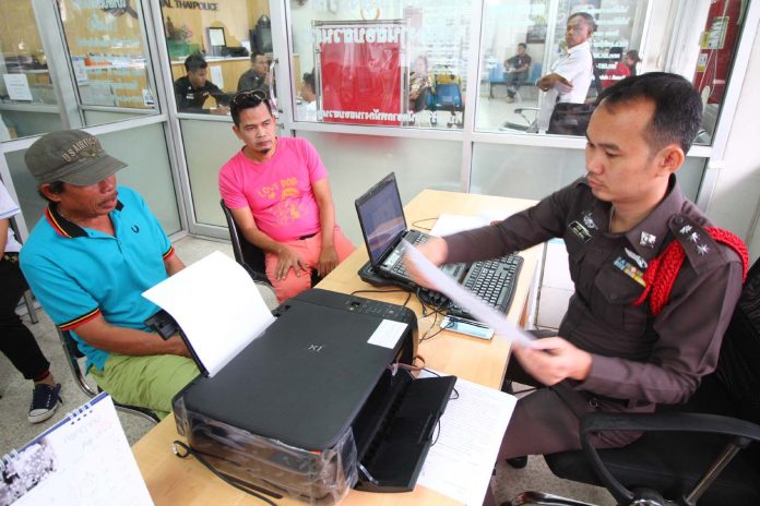 A 2017 file photo of a theft victim filing complaints with police.