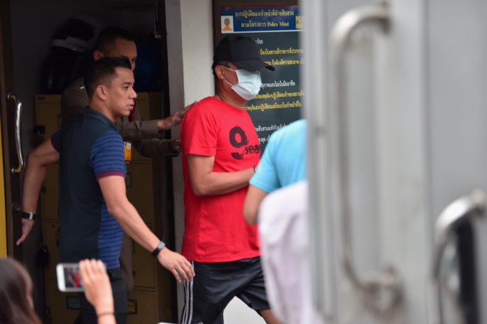 Kantapong Huadsri was being taken to the Criminal Court Wednesday after police inquiry. Kantapong Huadsri was being taken to the Criminal Court Wednesday after police inquiry.