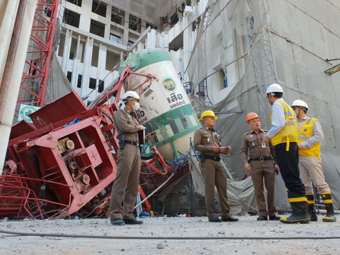 Police and engineers on Thursday at the construction site where a crane collapsed and killed five people in Bangkok. Police and engineers on Thursday at the construction site where a crane collapsed and killed five people in Bangkok.