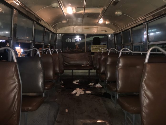 The scene inside a bus Sunday where a Bangkok student was stabbed multiple times after a brawl. The scene inside a bus Sunday where a Bangkok student was stabbed multiple times after a brawl.