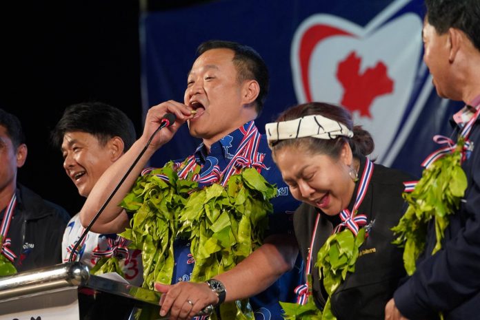 Bhumjaithai Party leader Anutin Charnvirakul, at center, at a Monday rally on Koh Lanta in Krabi province.