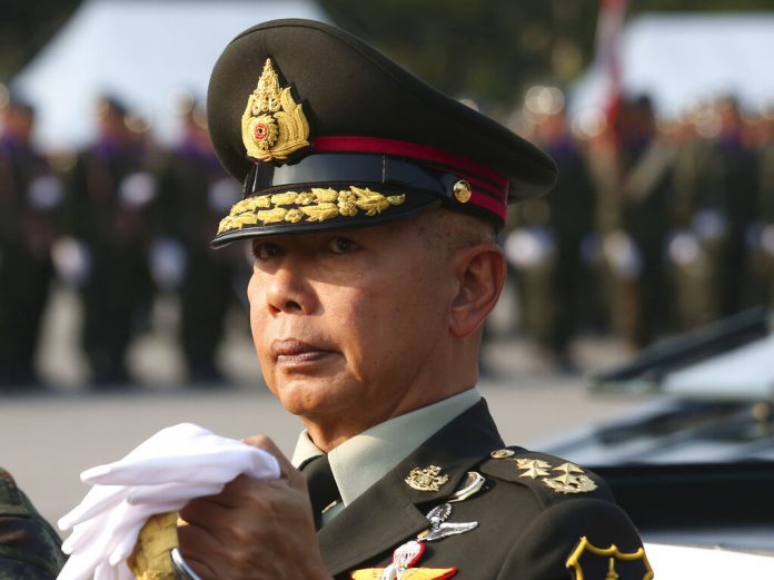 Apirat Kongsompong In this Friday, Jan. 18, 2019, file photo, Thai army chief Gen. Apirat Kongsompong reviews the guard of honor during the Royal Thai Armed Forces Day ceremony at a military base in Bangkok, Thailand. Photo: Sakchai Lalit / Associated Press
