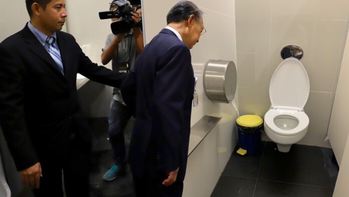 In this Photoshopped collage, Lower House Speaker Chuan Leekpai inspecting a toilet inside the new Parliament building on Aug. 15.