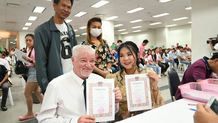 A foreign man and Thai woman register their marriage in Bangkok on Feb. 14, 2019. A foreign man and Thai woman register their marriage in Bangkok on Feb. 14, 2019.