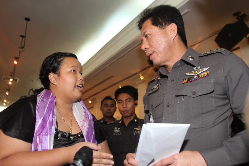 Policemen arrived at the Foreign Correspondents' Club of Thailand to block a forum on human rights in post-coup Thailand from taking place, 2 Sept 2014.