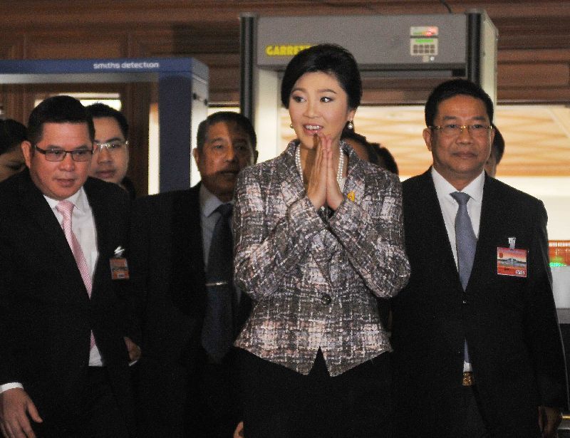 Yingluck arriving at the Parliament House for her final impeachment hearing on 22 Jan 2015.<br />