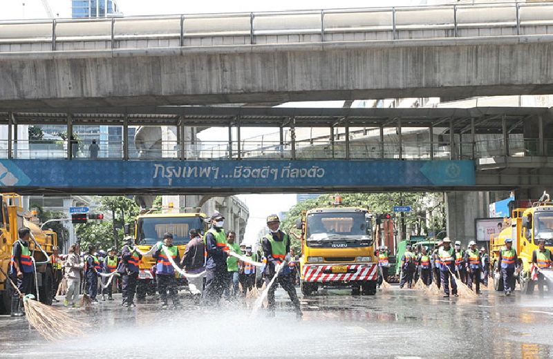 A small army of city workers power washed the scene of Monday night's crime on Tuesday morning.