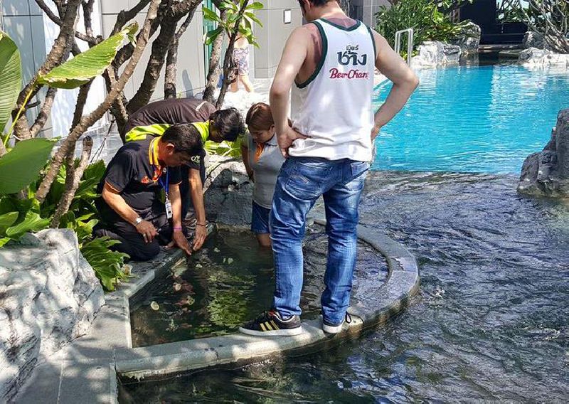 Yahir Ben Weitzel, at right, in a photo said to be at the rooftop 'on sen' of the The Address Asoke posted Friday to Facebook. Weitzel family / Facebook