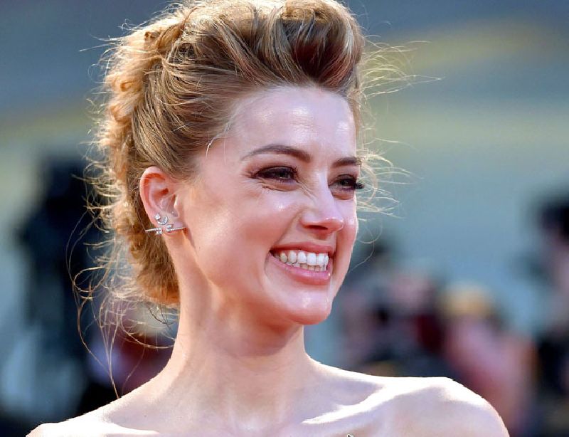 U.S. actress Amber Heard arrives for the premiere of 'The Danish Girl' on Sept. 5 in Venice, Italy. Photo: Ettore Ferrari / EPA