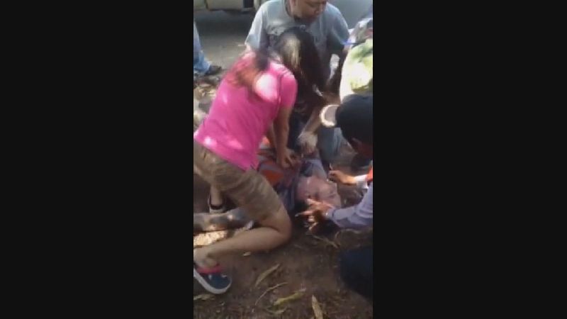 A 39-year-old nurse, Srikanya Cheuarop, was trying to rescue a German cyclist as seen in a video posted Saturday.