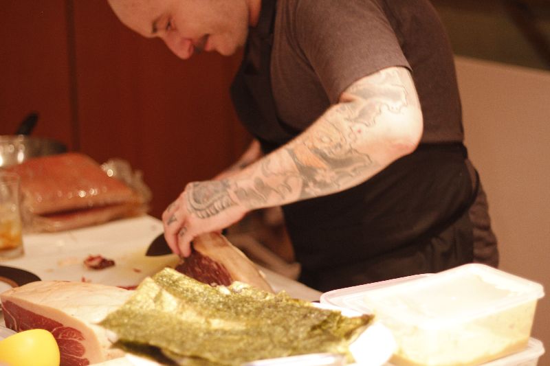 Jess Barnes cutting up some Iberico Ham at Frying Pan 1.0