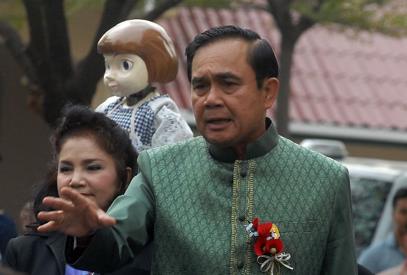 Junta chairman Prayuth Chan-ocha speaks to reporters Tuesday at Government House in Bangkok.
