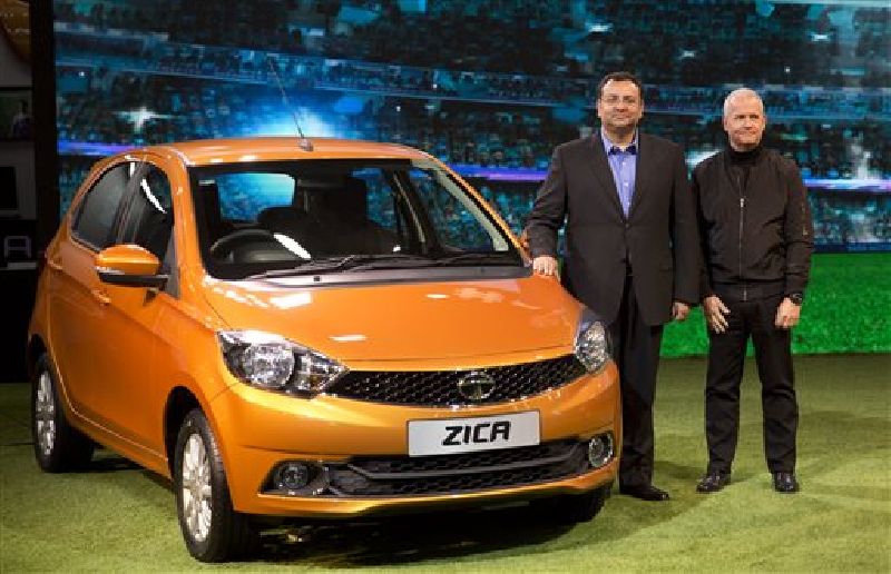 Tata Motors Chairman Cyrus Mistry, left, and Tim Leverton, head of Tata Engineering and Research and Development, pose for photographers during the unveiling of Zica at a press preview of Auto Expo in Greater Noida, near New Delhi, India, Wednesday, Feb. 3, 2016. Photo: Manish Swarup / AP