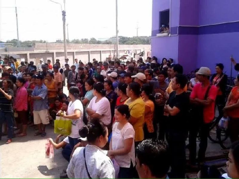 Workers on strike Friday outside a Golden Prize Canning factory in Samut Sakhon province. Photo: Courtesy Andy Hall / Migrant Workers Rights Network