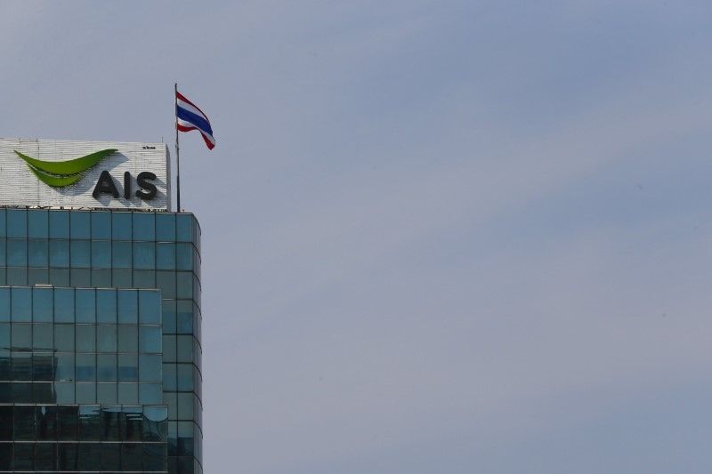 The logo of Advance Info Service Public Company Limited at its office building in central Bangkok, March 11, 2016. Photo: Athit Perawongmetha / Reuters