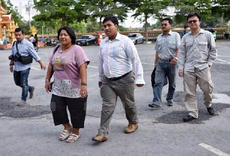In this Dec. 9, 2015, file photo, Patnaree Chankij and her son Sirawith Seritiwat arrive for a meeting with military representatives at a temple in Bangkok.<br />