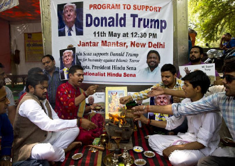 Activists of right-wing Hindu Sena or Hindu Army make offerings to the fire god while conducting Hindu rituals to ensure a win for U.S. presidential candidate Donald Trump in New Delhi, India, Wednesday, May 11, 2016. Photo: Saurabh Das / Associated Press