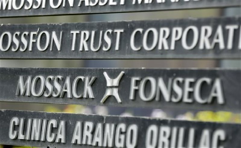 In this April 4, 2016 file photo, a marquee on a building in Panama City, Panama, lists the Mossack Fonseca law firm, one of the leaders in setting up offshore bank accounts for the rich and powerful. Photo: Arnulfo Franco / Associated Press