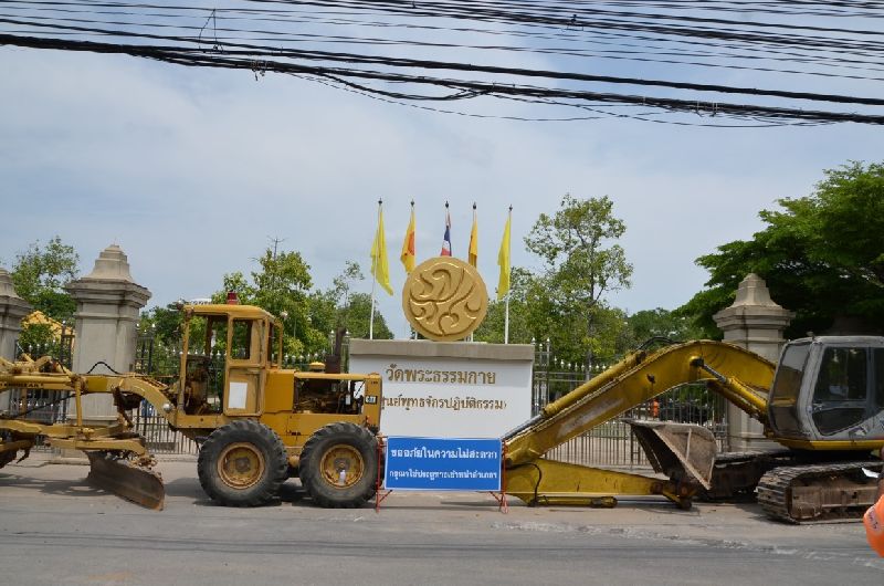 Excavators block entrance to Wat Thammakaya on May 27.