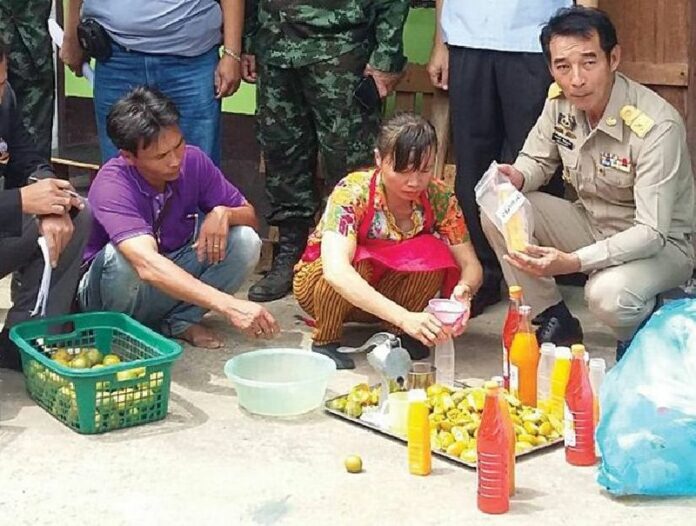 Security officers arrest Vietnamese nationals on May 23 in Saraburi province for producing orange juice without a proper permit.