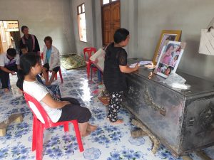 Parents and family mourn a daughter killed in the Pitakkiat Wittaya School fire on May 31 at their home in Chiang Rai province.
