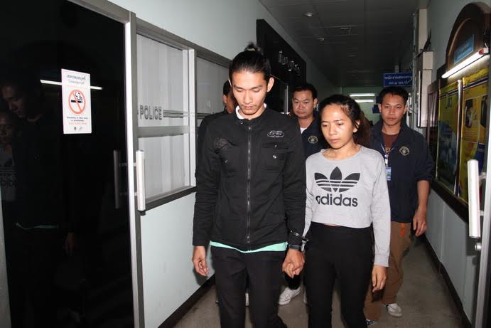 Piyanat Boriphan and Sunanta Sodsoon are brought to Crime Suppression Division in Bangkok Thursday.