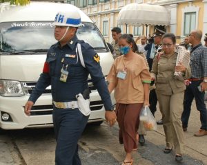Security officers brought Nattatika Worathaiwit to the martial court on Wednesday to hear her bail ruling.