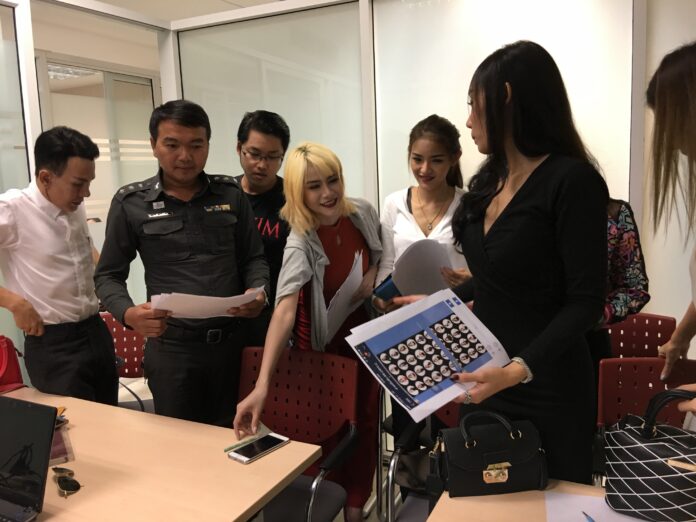 Seven Maxim models file charges today at Technology Crimes Suppression Division.