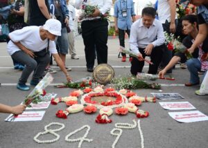 Activists lay garlands and candles at the 1932 Revolution plaque on 24 Jun. 2016, the anniversary of the 1932 popular uprising in Bangkok.