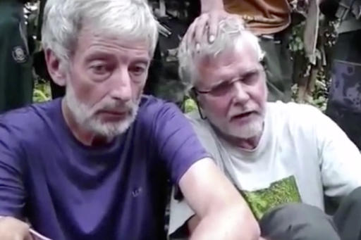 This file image made from undated militant video, shows Canadians Robert Hall, left, and John Ridsdel, right. Photo: Associated Press