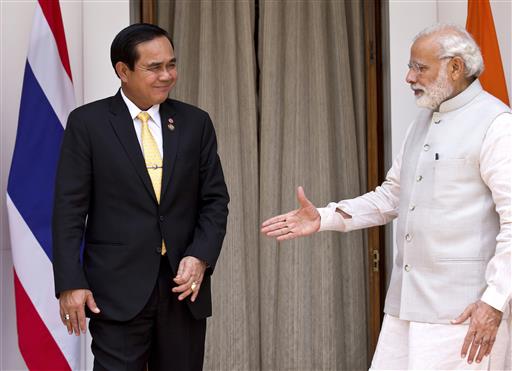 Indian Prime Minister Narendra Modi, right, greets Thailand's Prime Minister Prayuth Chan-ocha, before a meeting in New Delhi, India, Friday, June 17, 2016. Photo: Saurabh Das / Associated Press
