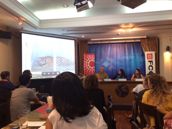 Seated from left, Edwin Wiek, Chatraporn Thamthong and Tanya Erzinlioglu discuss the now-shuttered Tiger Temple on Wednesday night at the Foreign Correspondents’ Club of Thailand in Bangkok.
