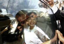 High Hopes and Deep Doubts Await Suu Kyi in Thailand