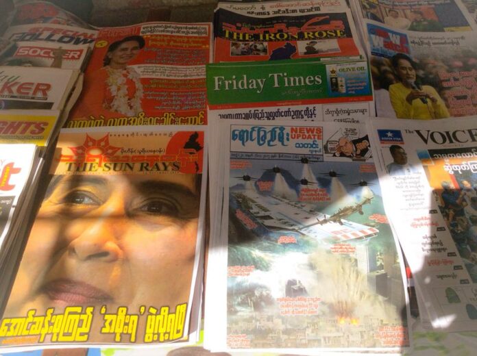 A file photo of newspapers for sale in Yangon.